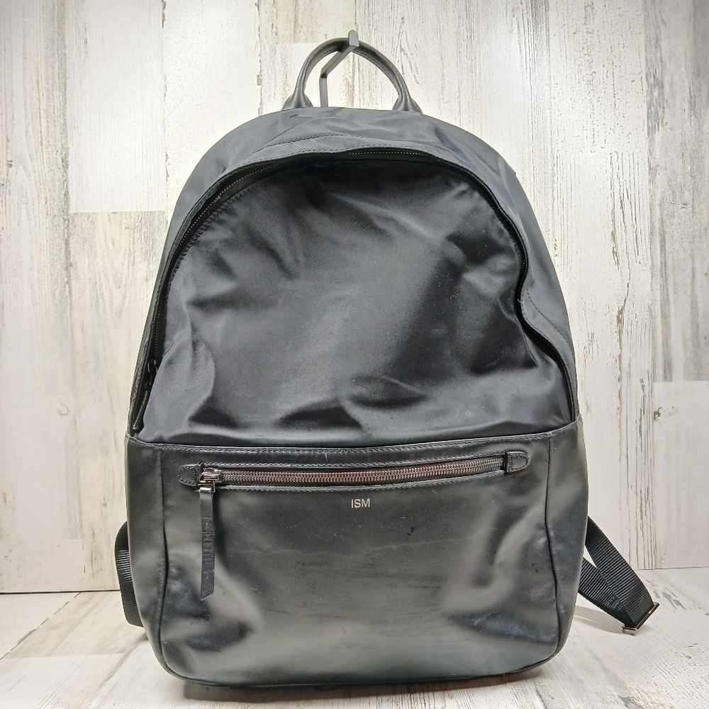 ISM Black Backpack with Front Pocket and Adjustable Straps
